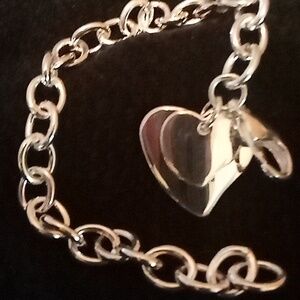 Solid sterling silver link bracelet with large heart on clasp